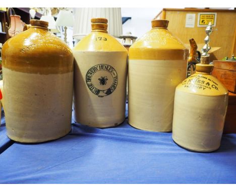 A stoneware flagon, J H Peel Watlington, another G T Jones & Co Carfax Oxford, another The Brewery Henley-on-Thames" and anot