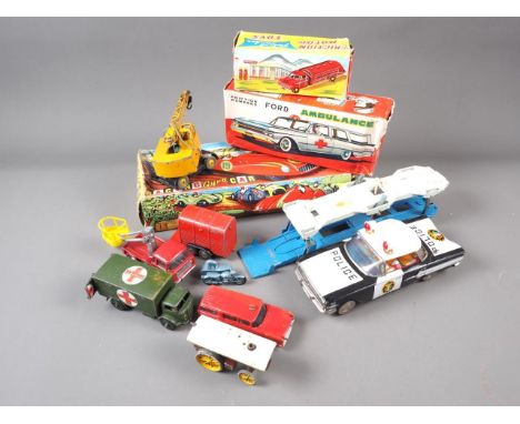 A Friction powered tin-plated ambulance in box, a similar Police car unboxed, a racing Gyro car Model N' 139, and a quantity 