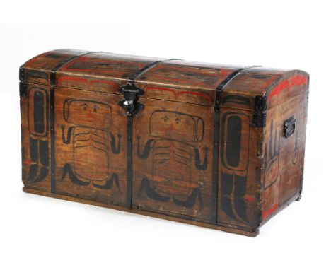 A Tlingit domed trunk North West Coast of America pine and metal bound with painted decoration, including ravens, whales, mas