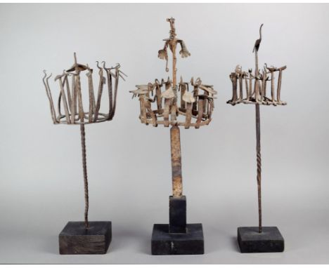 Three Yoruba Osanyin staffs Nigeria iron with crowns of birds, one with a chameleon/bird finial and with incised decoration t