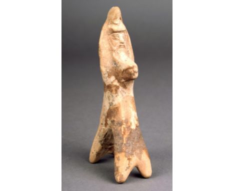 A Greek horse and rider group 5th - 4th century BC ceramic with a bearded figure wearing a Phrygian cap and cloak, 12.2cm hig
