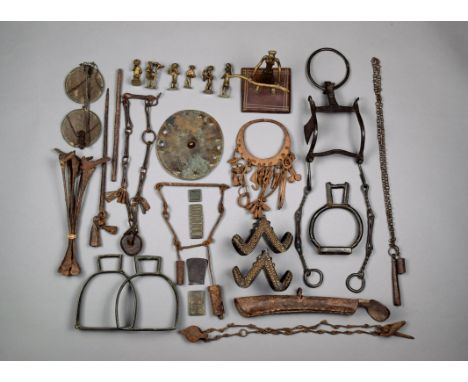A Dogon circlet Mali iron, and hung with various charms, 20cm long, four similar chains, seven Liberian iron Buji currency, a