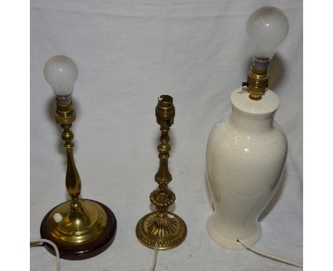 2 brass table lamps and a ceramic table lamp and various shades