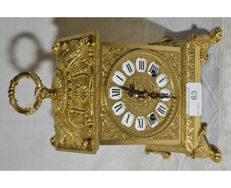 Italian two train clock in brass case 