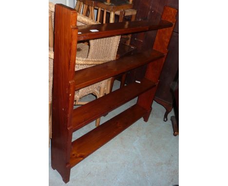 Four tier stained pine wall shelf 