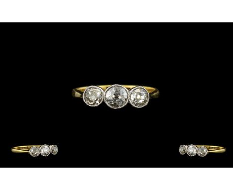 18ct Gold and Platinum Attractive 3 Stone Diamond Set Dress Ring of Pleasing Form. The Diamonds of Good Colour and Sparkle. R