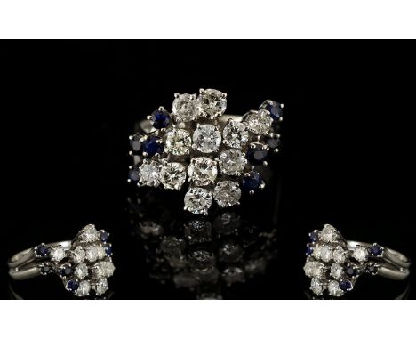 18ct White Gold Attractive Diamond And Sapphire Set Cluster Ring flower head design diamonds and sapphires of excellent colou