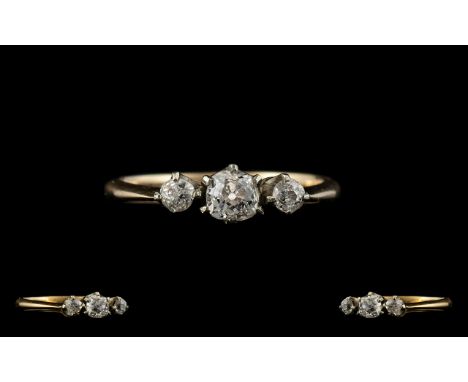 18ct Gold and Platinum 3 Stone Diamond Ring, The Cushion Cut Diamonds of Good Colour / Clarity. c.1920's. Ring Size - J. Mark