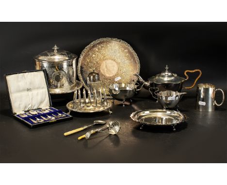 A Small Mixed Lot Of Antique Silver Plated Ware To include a three piece tea service of shaped form with scalloped edge, smal