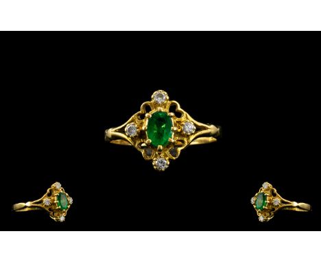 18ct Gold Petite and Attractive Emerald and Diamond Set Dress Ring, Set with a Natural Colombian Emerald of Excellent Colour.