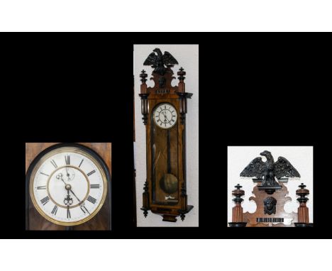 Vienna Wall Clock Late 19th/Early 20th century wall clock of typical form, white ceramic dial with Roman numerals, mask and e