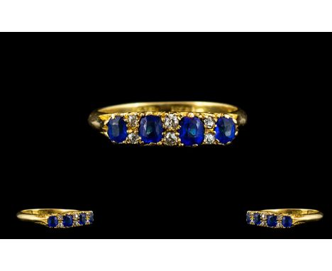 Edwardian Period 18ct Gold Sapphire and Diamond Set Ring In a Gypsy Setting, The Four Faceted Sapphires of Stunning Colour an