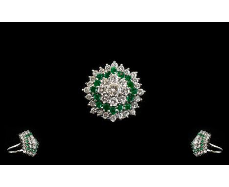 18ct White Gold Large and Impressive Emerald and Diamond Cocktail Ring - of flower head design. Both diamonds and emeralds of