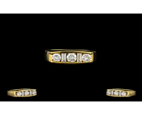 Ladies 9ct Gold Nice Quality And Pleasing Five Stone Diamond Ring. The Three Round Brilliant Cut Diamonds With Emerald Cut Di