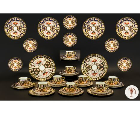 Royal Crown Derby Old Imari Pattern 2451 Twelve Trios To include twelve cups, saucers and side plates along with two cake pla