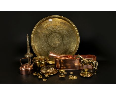 A Mixed Quantity Of Metalware approx 11 items to include large etched brass North African wall chargers, smaller circular cha