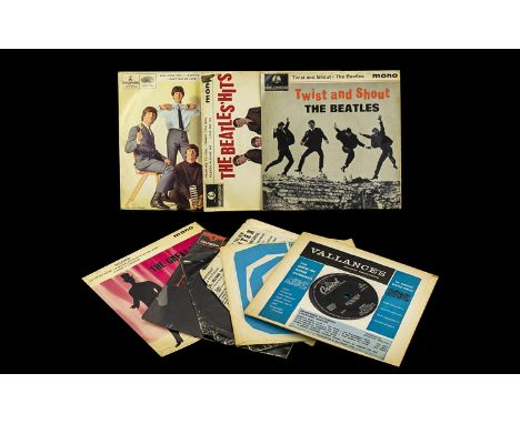 A Collection of Vinyl Single Records including The Beatles, Twist and Shout, The Beatles Million Sellers, 'She Loves You', 'I