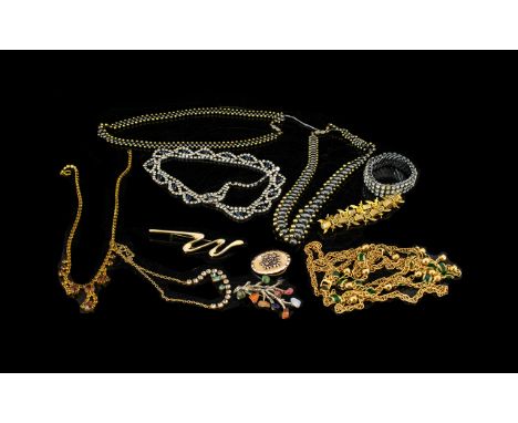 A Collection of Quality Costume Jewellery to include a vintage oval scarf clip with sunflower design, a brooch tree-shaped wi