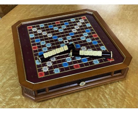 FRANKLIN MINT: SCRABBLE - THE COLLECTORS EDITION, with 24k gold plated tiles, hardwood framed playing board with raised grid,