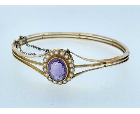 15CT GOLD AMETHYST & SEED PEARL HINGED BANGLE, 14.5gmsProvenance: private collection Pembrokeshire, consigned via our Carmart