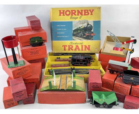 HORNBY O GAUGE NO.41 TINPLATE CLOCKWORK TANK PASSENGER SET, complete in yellow/blue box with BR 0-4-0 loco, 2 coaches, guard 