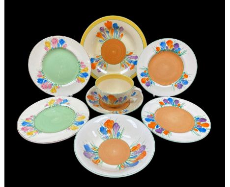 ASSORTED CLARICE CLIFF 'CROCUS' PATTERN TABLEWARE, including breakfast trio, cereal bowl and 2 tea plates, pair tea plates (8