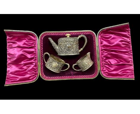 CASED VICTORIAN SILVER BACHELOR'S TEA SET, Horace Woodward & Co, London 1889, comprising teapot, sucrier and milk jug, in cla