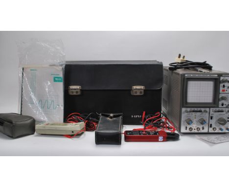 Hameg - A vintage 20th Century Dual Trace Oscilloscope HM 412 by Hameg appears in working order with probe, cable and manual.