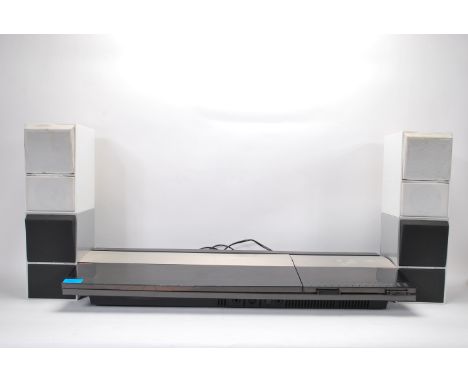 Hi-Fi- A vintage / retro 20th Century Bang and Olufsen Beocenter 2200 Hi Fi record player / tape player together with a set o