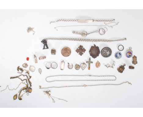 A collection of vintage silver and silver white metal jewellery to include a fret work brooch reading Lucy, a hallmarked iden