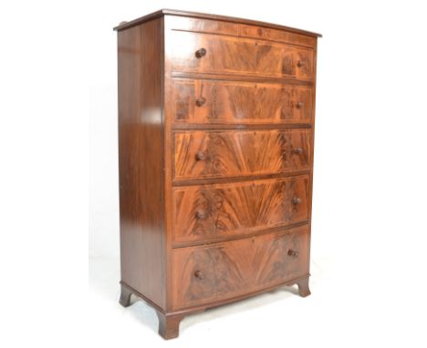 A mid century good quality large tallboy chest of drawers having figuratve walnut bank of 5 drawers with knob handles and inl