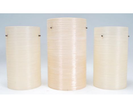 A group of three vintage retro 20th Century fibreglass spun light / lampshades in a neutral colour, each retaining original f