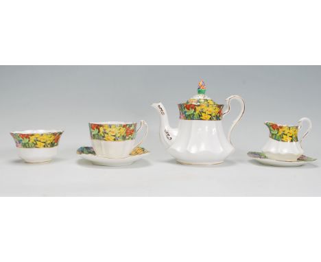 A Paragon fine bone china bachelors tea service in the Springtime pattern having gilt detailing. The set consisting of a teap