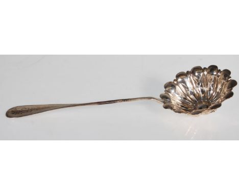 A French silver Victorian tea strainer spoon of reeded form with pierced decoration. Stem stamped with Minerva mark. Weight 4