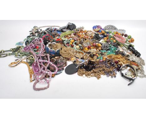 A large collection of vintage costume / fashion jewellery to include a wide selection of beaded and chain necklaces, bracelet