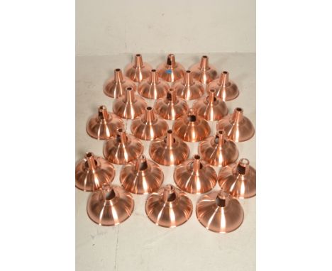 A set of 24x 20th Century retro vintage industrial copper ceiling light shade fixtures having a copper coated metal conical b