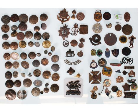 A collection of enamelled club badges and military related cap badges from a metal detector's collection to include including