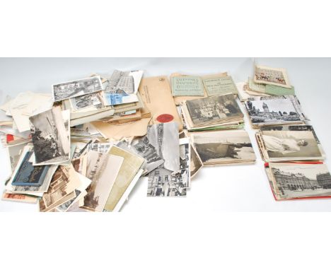 A collection of vintage world postcards dating to the early 20th Century to include silk examples,many German cards,Britain, 