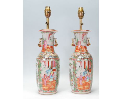 A pair of 19th Century Cantonese ceramic table lamps of baluster form hand painted panels depicting with narrative scenes, th