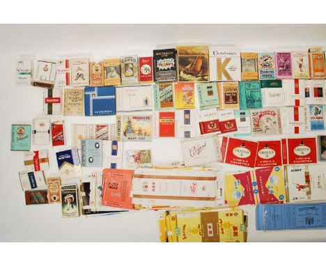 A collection of vintage 20th Century cigarette packets and paper cigarette packet labels to include Tadd &amp; Co, Churchmans