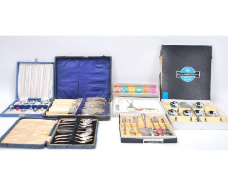 A collection of vintage 20th Century cased / boxed flatware / table cutlery the sets within original cases consisting of frui