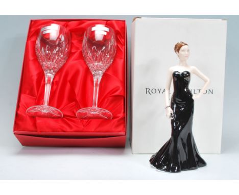 A boxed Royal Doulton ceramic figurine from the Pretty Ladies collection named Jasmine HN5483 together with a cased pair of c