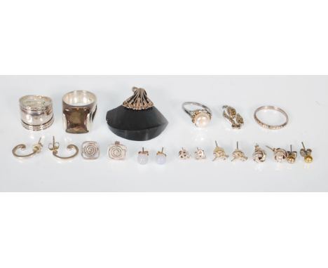 A selection of silver and white metal jewellery to include a stamped 925 ring set with a smokey coloured stone, a white metal