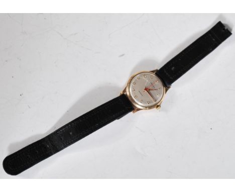A vintage Majex 21 jewels incabloc gentleman's wristwatch having a round face with a silvered dial with gilt arabic numerals 