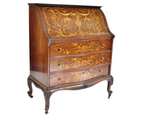 A 19th century mahogany inlaid Piedmont manner Italian serpentine bureau desk. Raised on slender legs terminating in brown ce