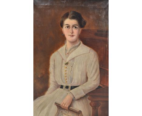 A large oil on canvas portrait study - painting of a French lady seated with copy of the La Marseillaise. Set within gilt fra