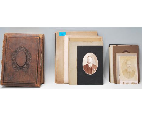 A collection of portrait photographs dating from the 19th Century, contained within a Victorian album and loose.&nbsp;