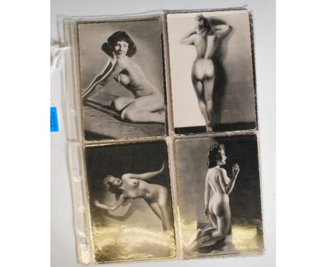 A collection of vintage mid 20th Century erotic / risqué female nude photo postcards x 10, in black and white measuring 6 x 4
