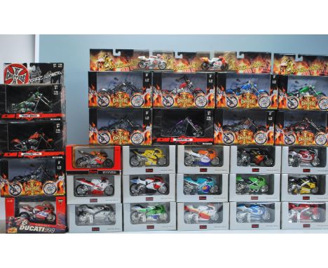 A large collection of boxed die cast model motor cycles&nbsp; 1/18 scale by Saico, examples to include Honda, Suzuki, Yamaha 