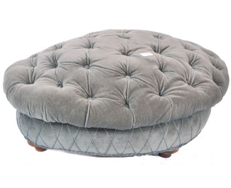 A 19th Century Victorian Chesterfield grey crushed velvet footstool or ottoman of serpentine lozenge shape having ' button ba